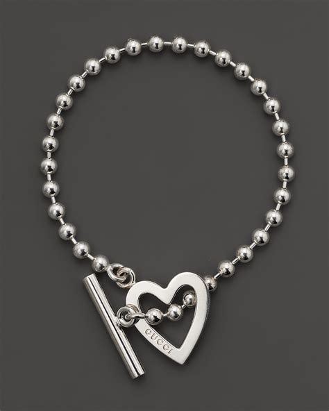 gucci 7 sterling silver flora heart bracelet|gucci sterling silver heart bracelet.